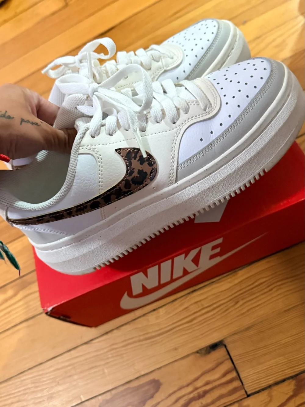 Nike Women’s White Sneakers with Leopard-Print Swoosh